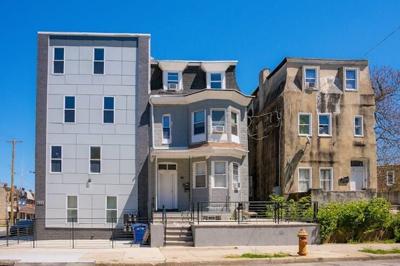 Signs of gentrification in Philly include new buildings that don’t fit the surrounding architecture.
              Jeff Fusco/The Conversation U.S., CC BY-SA