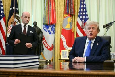 White House Deputy Chief of Staff Stephen Miller holds an executive order on birthright citizenship as President Donald Trump speaks before signing it at the White House on Aug. 6, 2026.