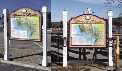 01-12 COM Meredith signs