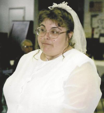 Melody E. Ash, 51