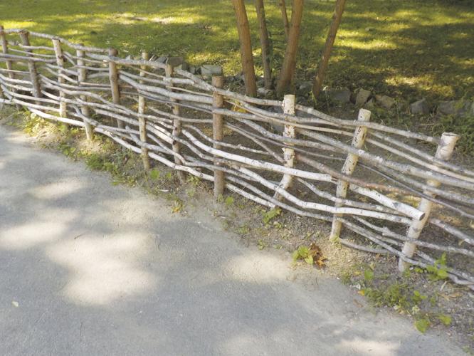 You could build this simple wattle fence