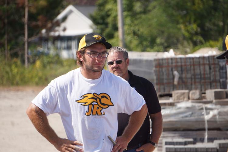 Holden Connell looks at his work