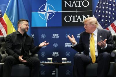 Ukrainian President Volodymyr Zelenskyy talks with U.S. President Donald Trump at the NATO summit on July 8, 2026.