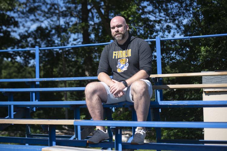 David Bedard on the bleachers