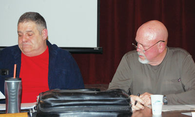 Gilmanton cuts police chief pay