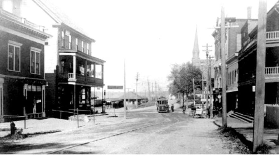 A trolley car heads through Lakeport Square