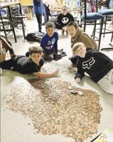 Woodland Heights coin drive breaks holiday fundraising record