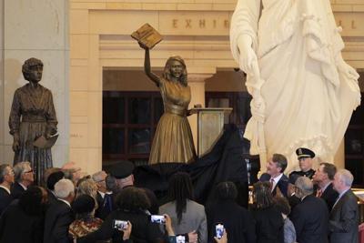 A statue of civil rights activist Barbara Rose Johns is unveiled in Emancipation Hall at the U.S. Capitol on Dec. 16, 2025, in Washington.