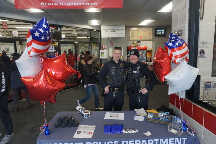 Lt. Evan Boulanger and Josh Landry at table