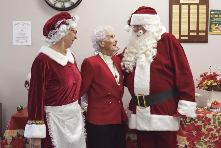 Doris Williams and Santa and Mrs. Claus
