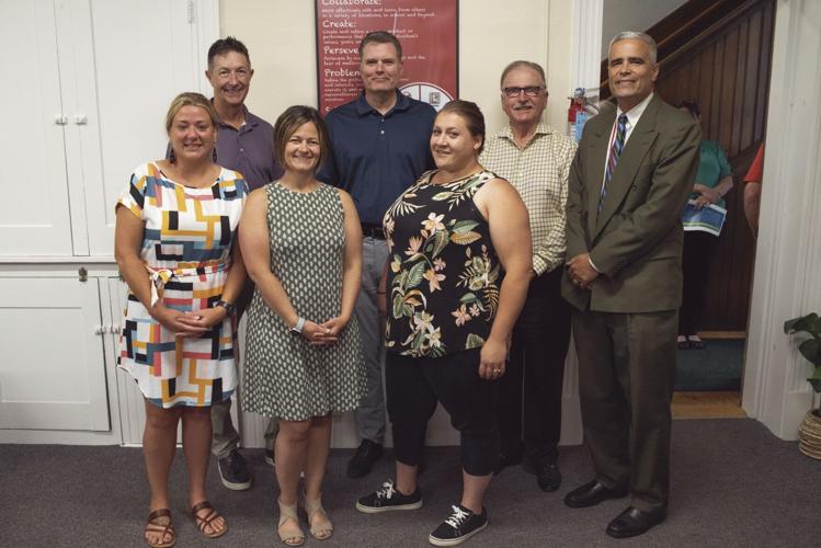 Melcher & Prescott with board