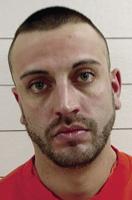 Man arrested on warrant now facing additional charges