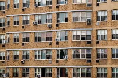 Many U.S. apartments have individual heating and cooling systems that are less efficient than current technology.