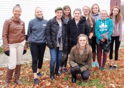 Gilford High School students helped give food pantry a spring clean-up