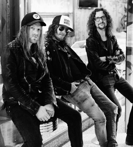 11-15 Cadillac Three