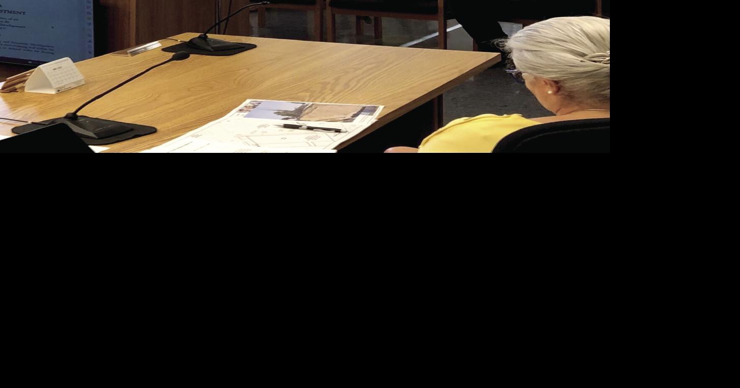 Neighbor to Elm St. project appeals zoning board retaining wall