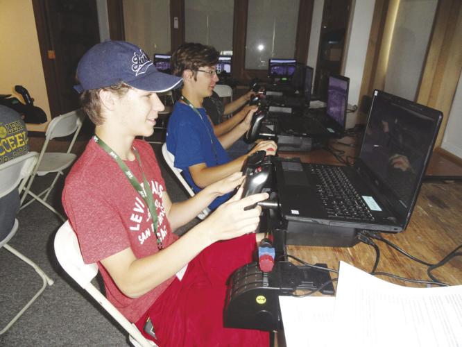 Previous ACE Academy students learning to fly