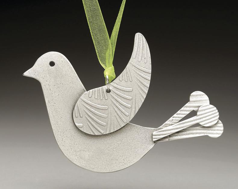 League of NH Craftsmen annual ornament is a pewter-cast design