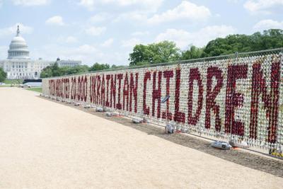 A fence featuring 20,000 stuffed teddy bears, each representing a Ukrainian child abducted by Russia, on the National Mall in Washington, D.C., on April 23, 2026.