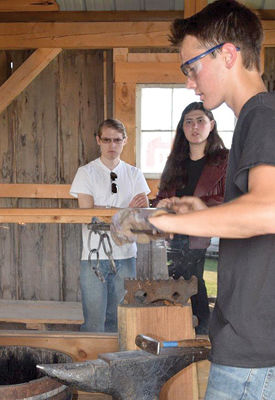 Worknman brothers learning to master blacksmith skills