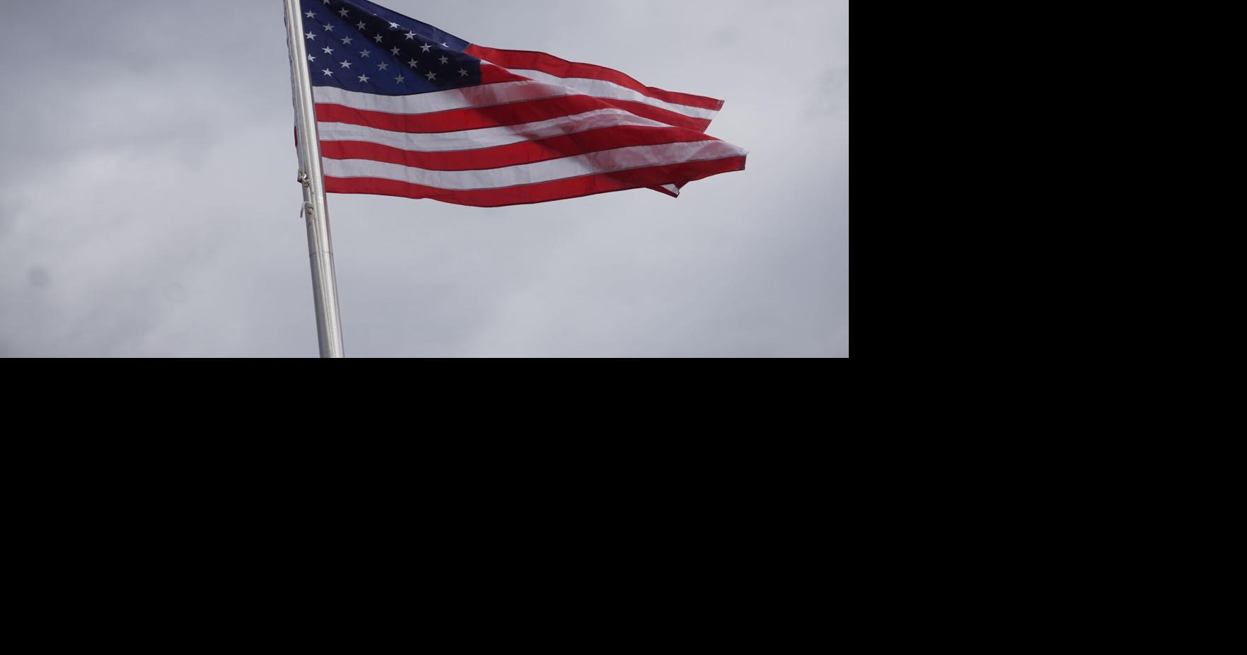 Kenney helps Meredith Bay Village raise new flag on Veterans Day ...