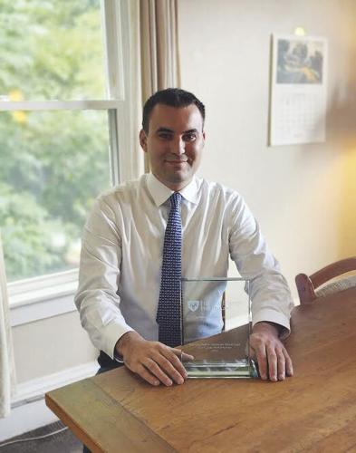 Colby Simpson receives Top Producer Award