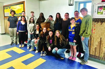 Franklin HS students walk at college grad