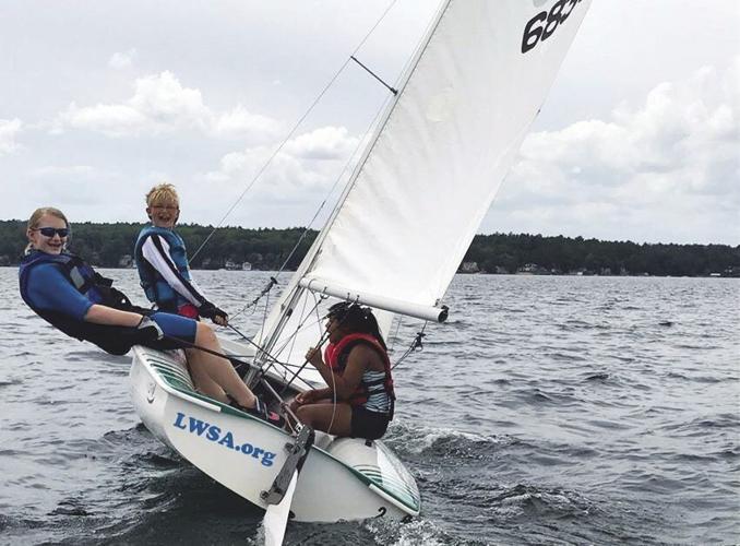 Three young teens enjoy the freedom