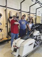Charity raffle winner claims new ride