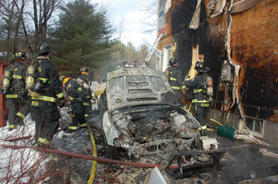 Jump-start destroys cars, scorches home