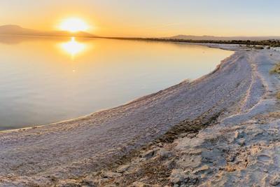 The Salton Sea is shrinking and releasing toxic dust from its lake bed.