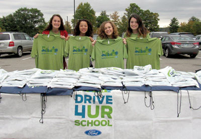 Test-drive event raises $1,700 for Belmont High