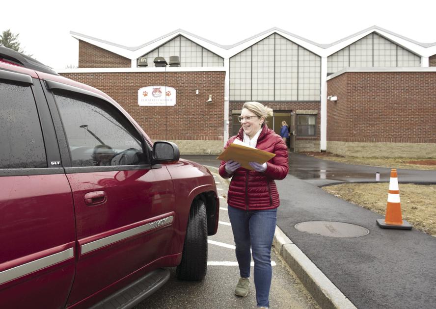 Schools hand out remote learning materials