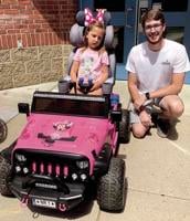 Kiddie car makes big difference for little girl