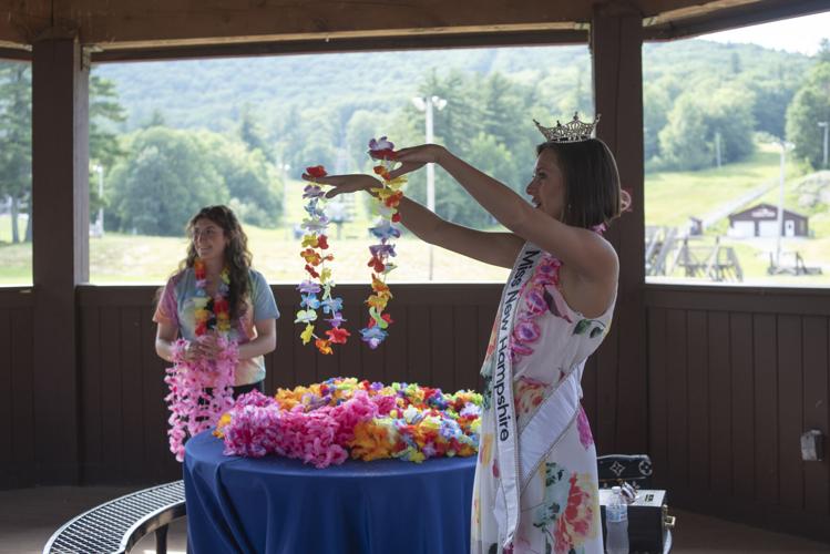 Xanthi Russell hands out leis