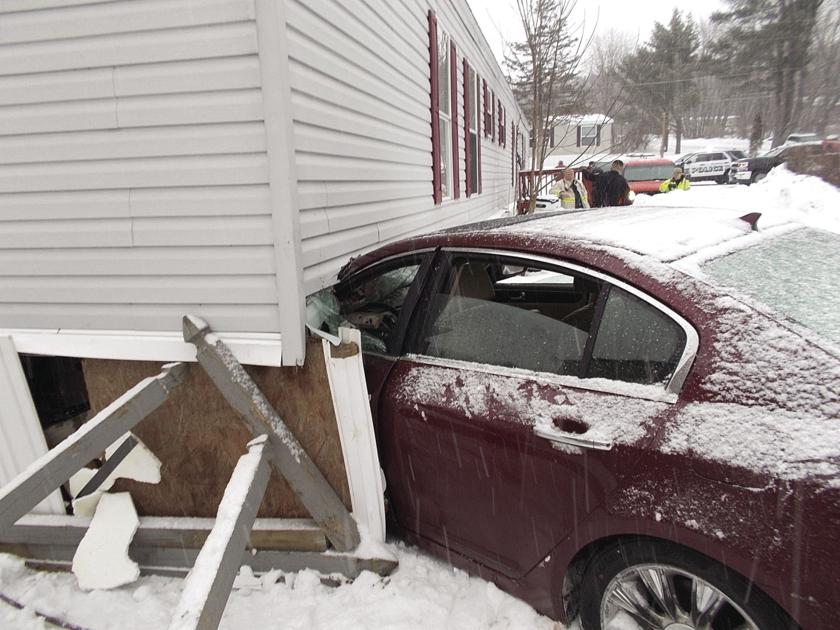 Car punches through mobile home&rsquo;s bedroom wall