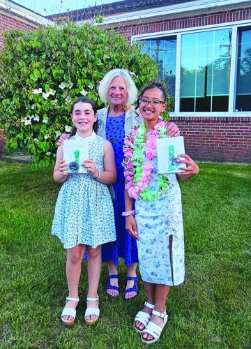 Xayiliyana Ly and Karlie Silva receive the Katie Knott-Garon Outstanding NHCS Cares Award