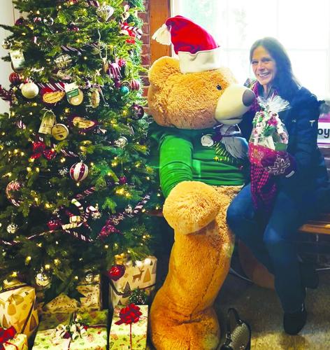 Kim Wilson wins Mill Falls Marketplace raffle