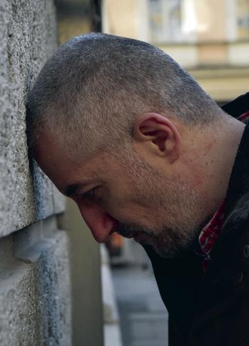 08-24 RE Metzger head against wall.jpg