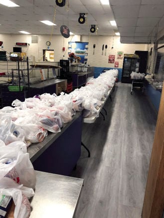Grab-and-go lunches feed I-L children