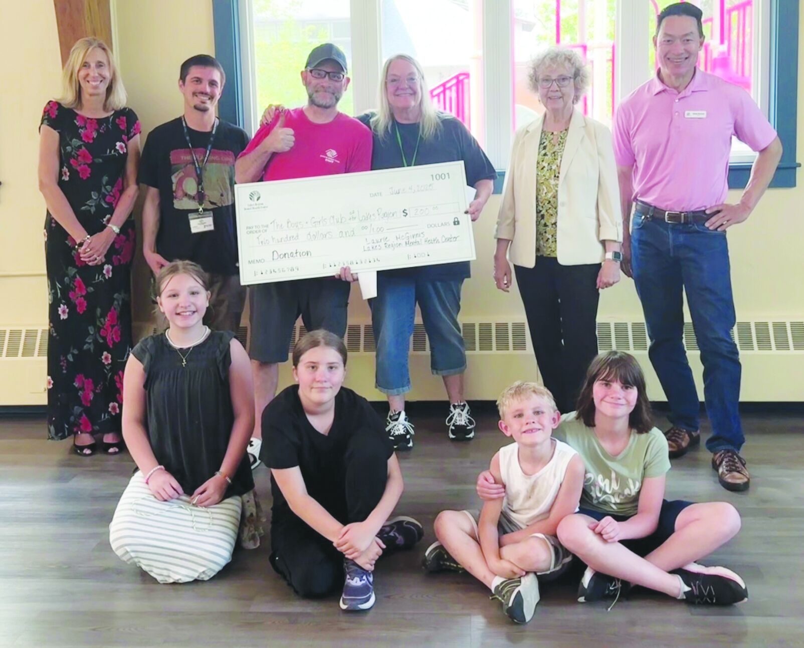 Volunteer gives $200 to Boys and Girls Club of the Lakes Region