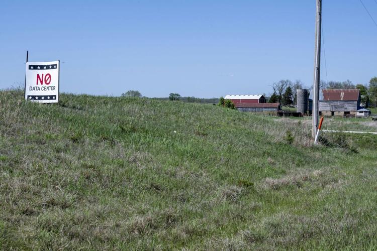 A sign in a small town in Kansas opposes a proposal for a data center nearby.