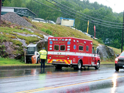 Worker hurt when machine rolls down hill