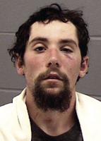 One of a trio arrested in brawl being held