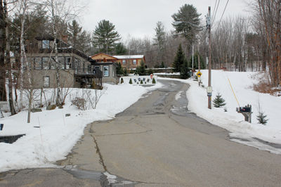 City wrestling with care of private roads