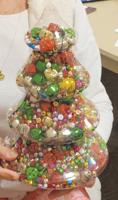 Meredith Lions Club hosts event to guess how many bells in a glass tree
