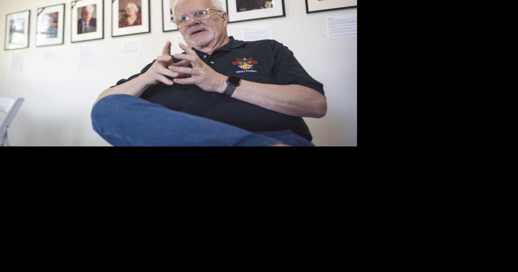 'Faces of Laconia' exhibit highlights community through portraits