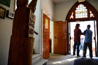 Supporters visit Javier Flores, right, while he lived in sanctuary at Arch Street United Methodist Church in downtown Philadelphia in 2017.