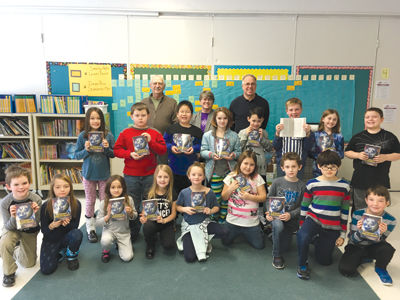 Grange donates dictionaries