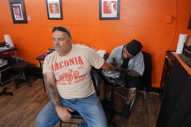Shawn Leger inks Dave Irizarry